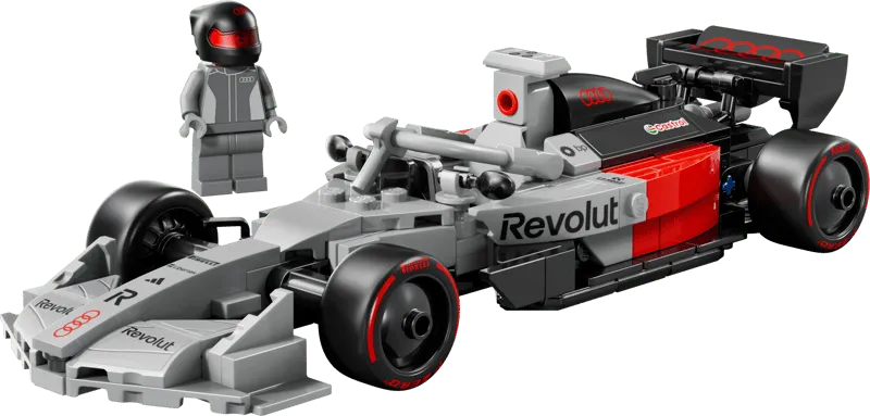 The assembled LEGO Audi Revolut F1 Team R26 Race Car 77259 with its driver minifigure standing next to it, showcasing the car's grey, red, and black design.