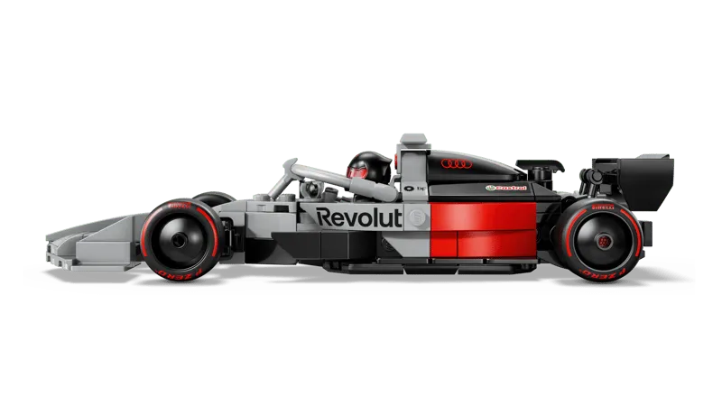 Right side view of the assembled LEGO Audi Revolut F1 Team R26 Race Car 77259, featuring the driver in the cockpit and details of the rear wing and wheels.