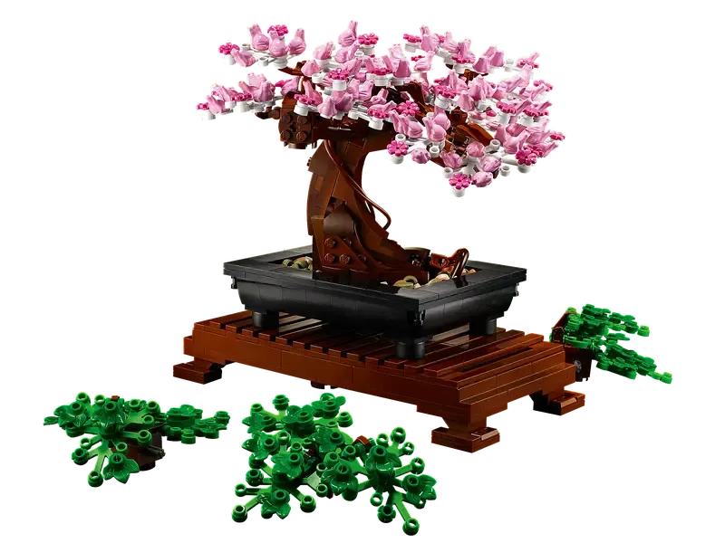 Pink bonsai tree with extra leaves.