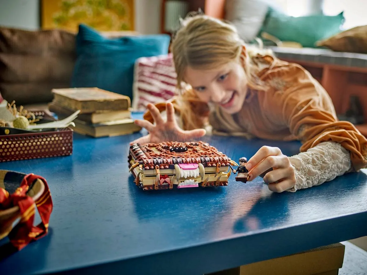 Child playing with book set