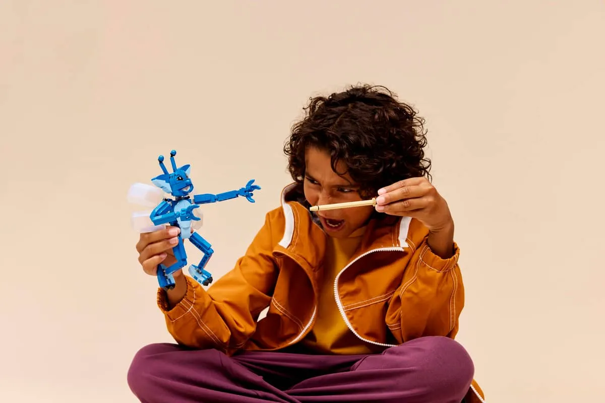 Child interacting with Pixie.