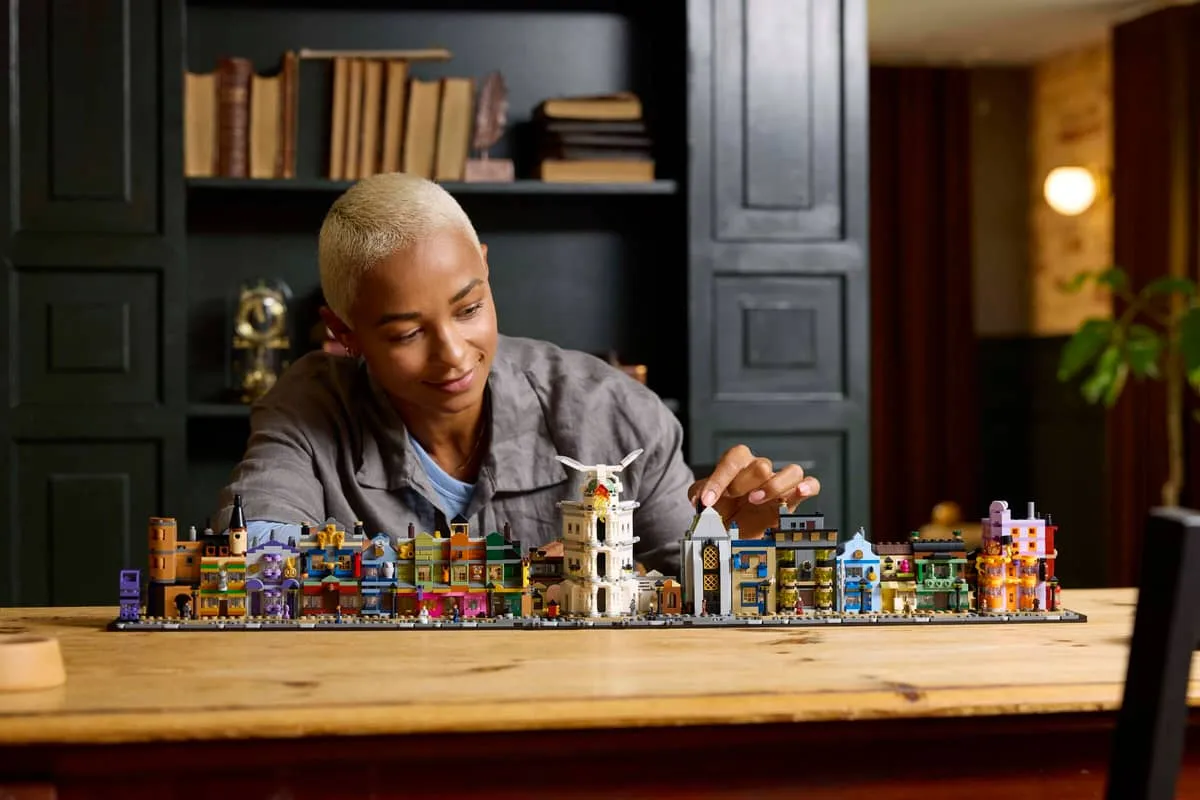 Person interacting with Diagon Alley model.