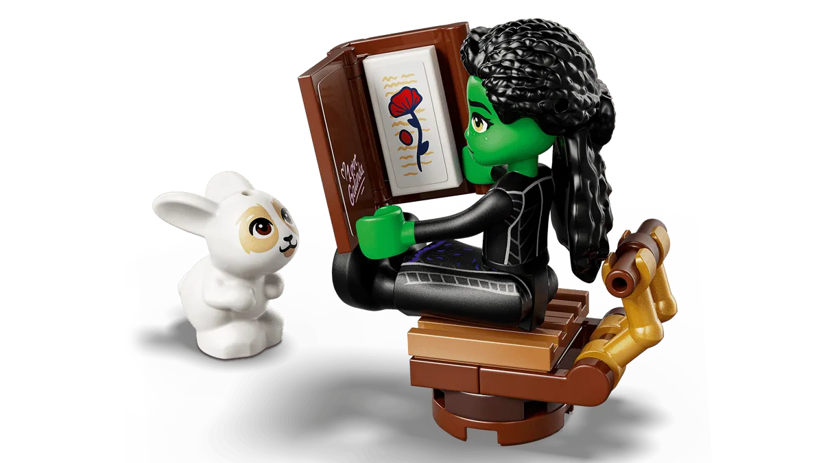 Elphaba reading a spellbook.