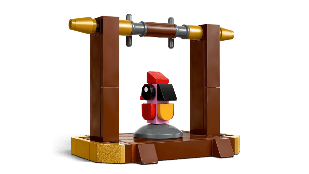 Close-up of the mini Fawkes figure on its perch.