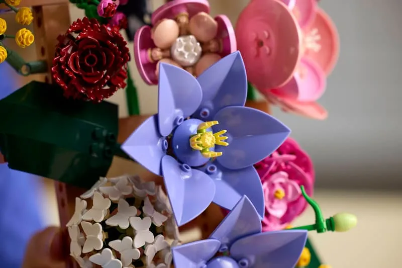 Close-up of purple and white LEGO flowers