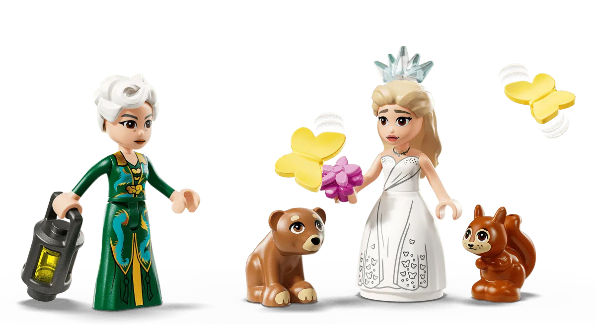 Glinda, Elphaba, and animal figures.