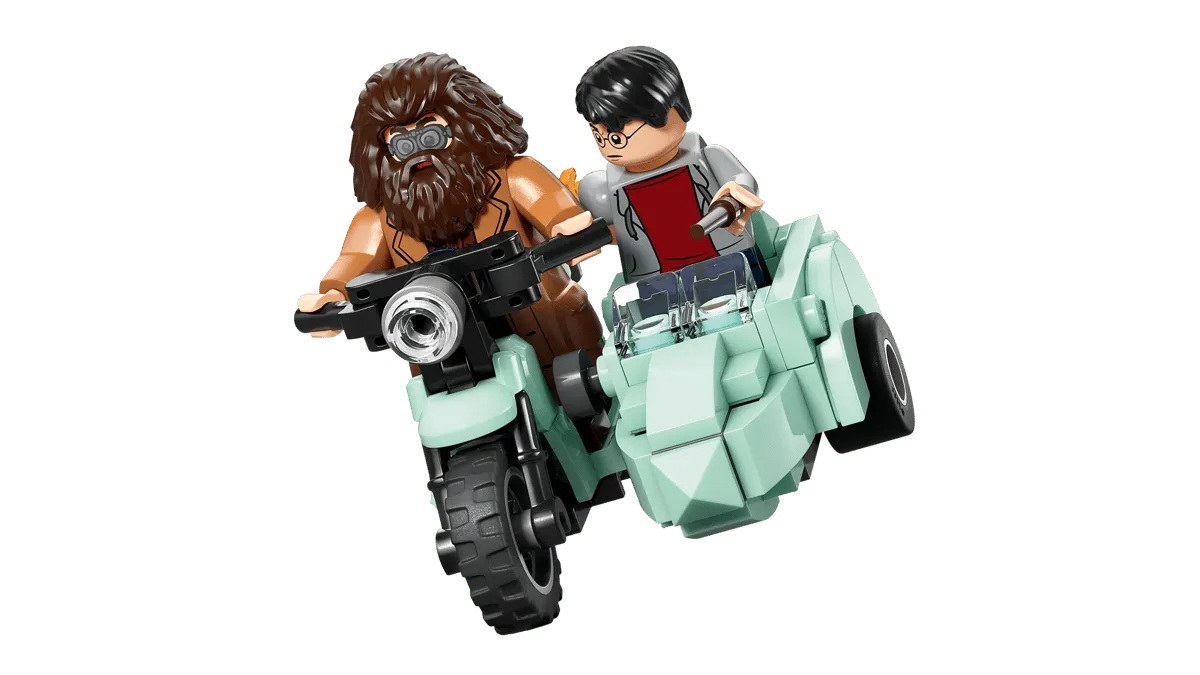 Hagrid and Harry on light aqua motorcycle.