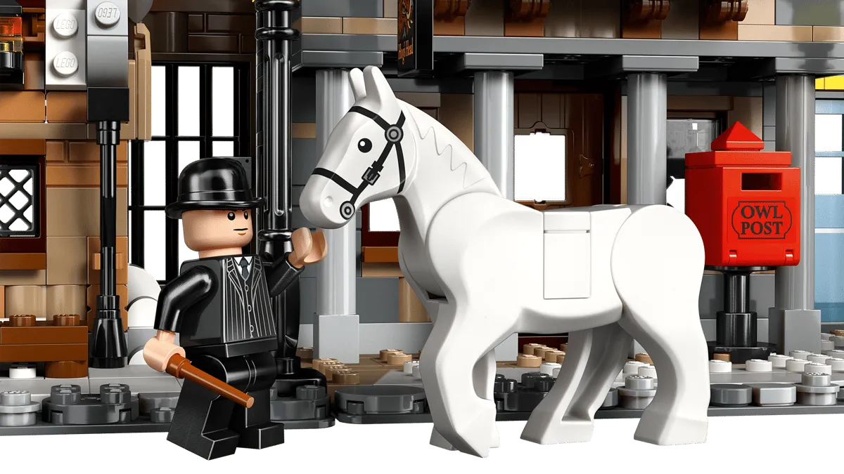 Minifigure, horse, and Owl Post.