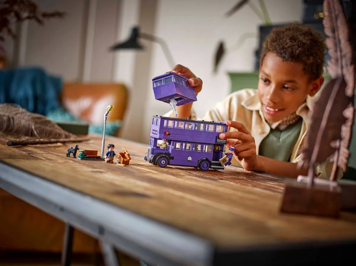 Child playing with Knight Bus.