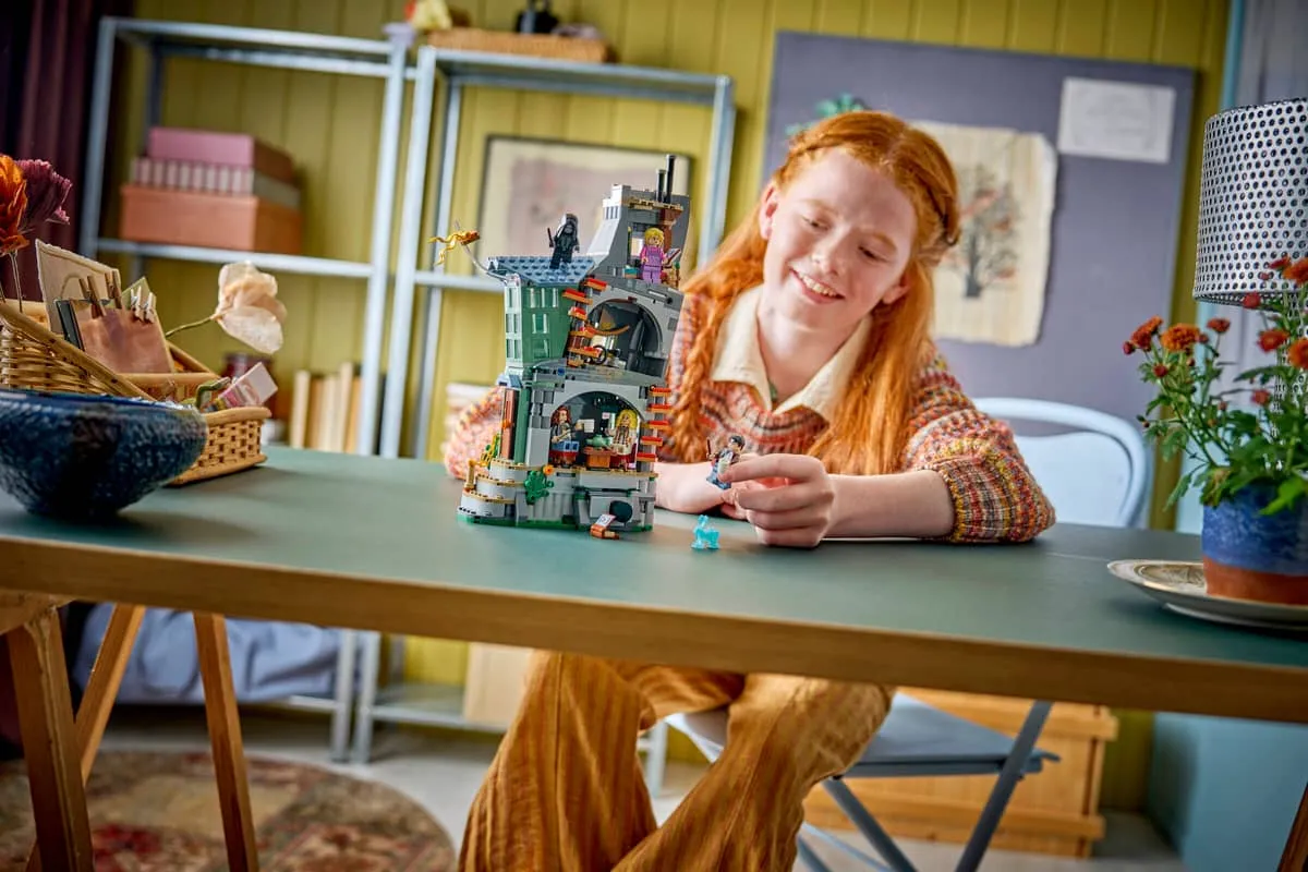Child playing with Luna Lovegood's House.