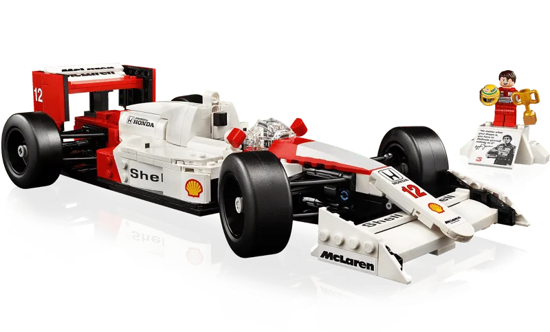 Angled view of the Lego McLaren MP4/4 model and Ayrton Senna minifigure from a low perspective.