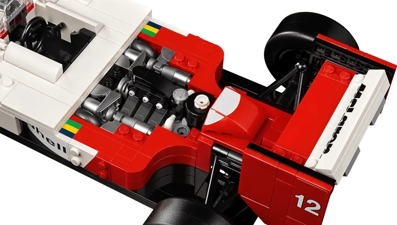 Close-up view of the detailed engine bay of the Lego McLaren MP4/4 model with the cover removed.
