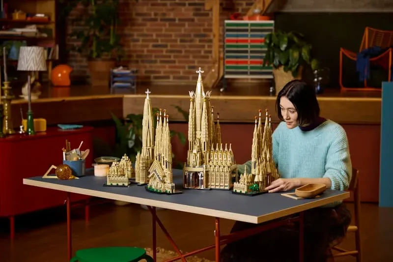 Person assembling model sections