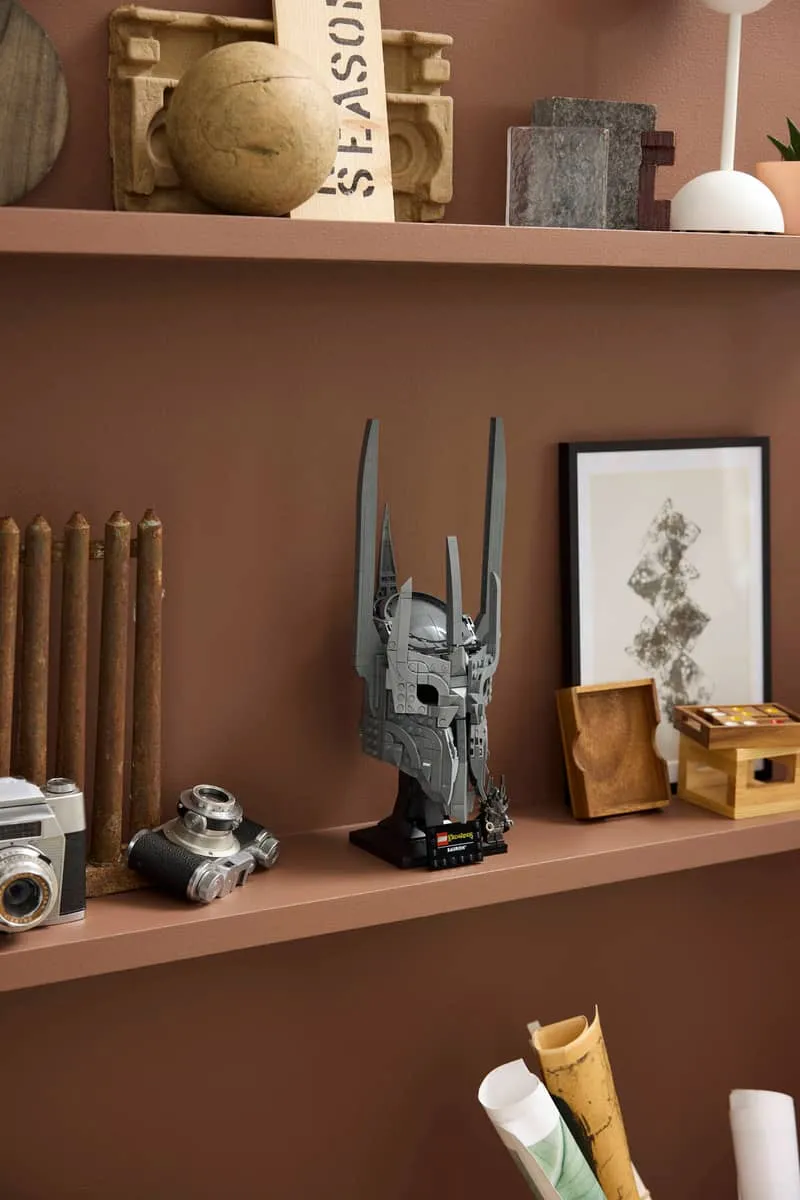 Sauron's Helmet on brown shelf.