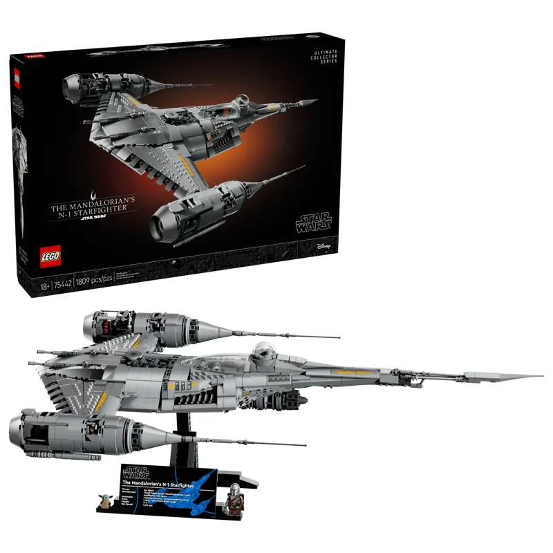 The Lego N-1 Starfighter UCS set box placed behind the fully built model on its display stand, complete with minifigures and info plaque.