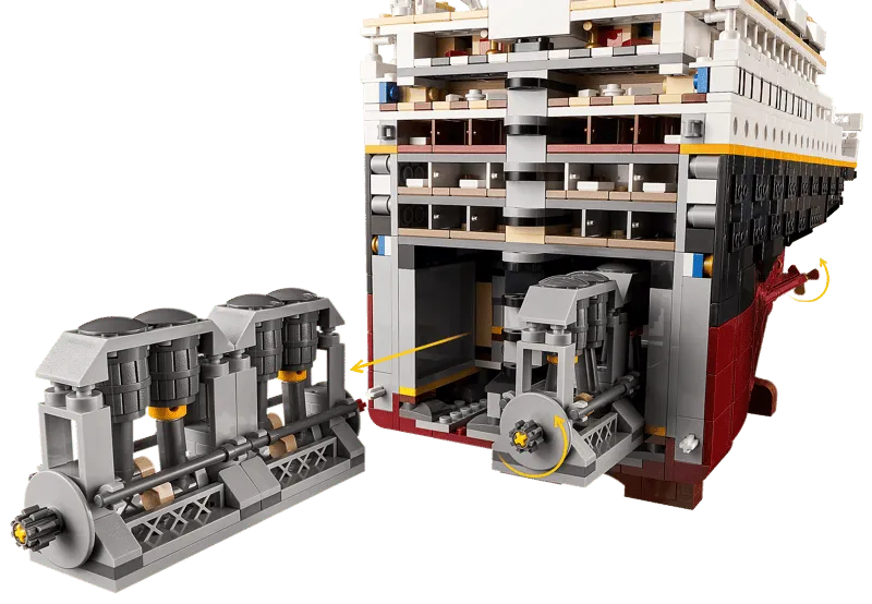 Interior view of the LEGO Titanic model, revealing a detailed brick-built engine room with visible pistons and crankshaft, which can be removed.