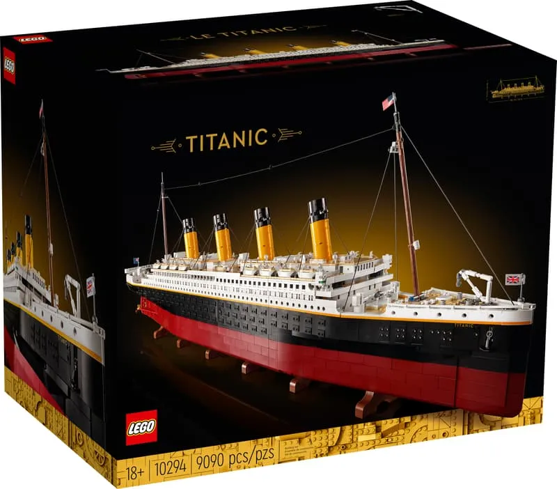 Front view of the LEGO Titanic 10294 box, showcasing the completed model against a black background with gold accents and product details.