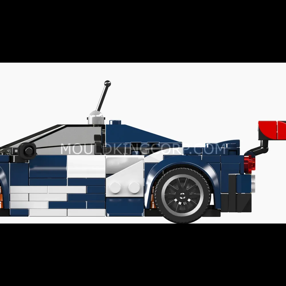 Rear view with spoiler and exhaust.