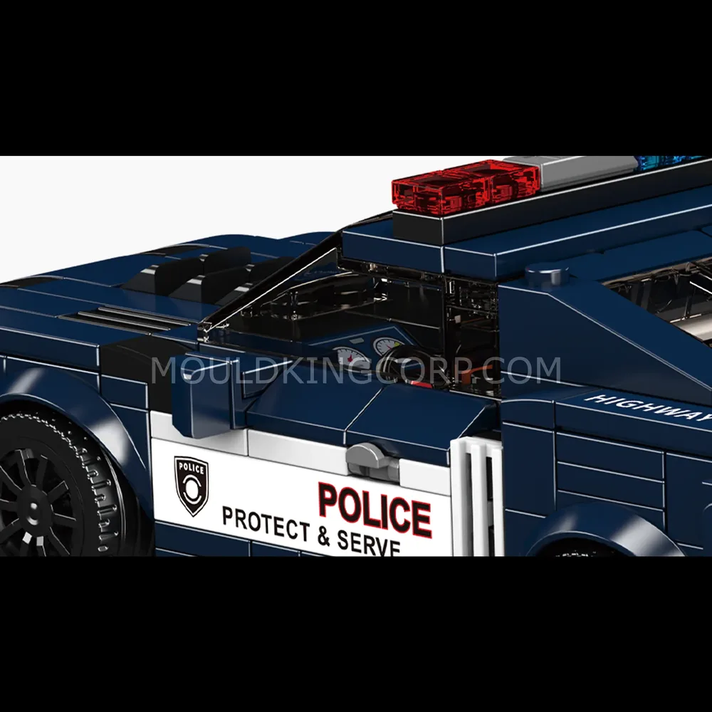 Front grill and headlight detail of the police car.