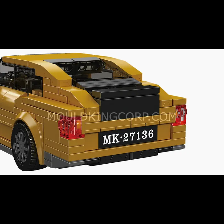 Rear-quarter view of the Mould King Spectre Electric Luxury Coupe 27136, featuring taillights, rear diffuser, and license plate.